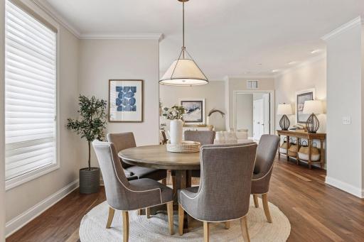 Dining area is large enough to accommodate a table with expansion capability.