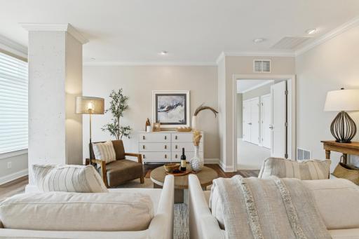 The living room has door onto large balcony.
