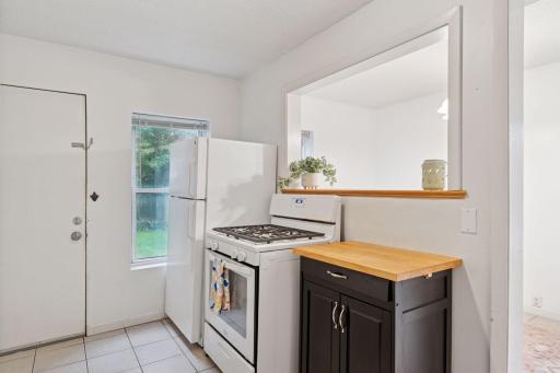 118 14th Avenue Northeast - Kitchen opens up to dining space - perfect for entertaining.