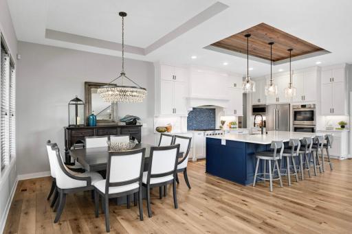 Plenty of seating for everyone in the dining room and at the kitchen island.