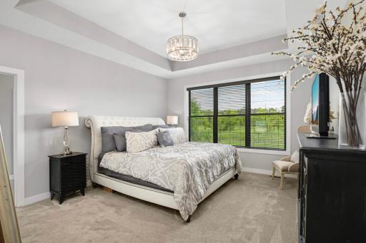 One of TWO main floor bedroom suites! This one is in a wing by itself and has a full private bathroom.