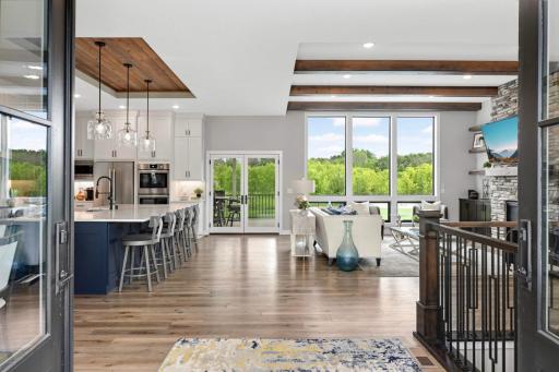 Double front doors welcome you into the kitchen, dining and great room space.