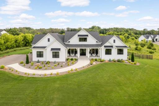 Stunning 2021 custom built walkout rambler on 6.56 acre lot in Greenfield!