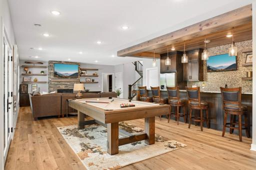 If you like to entertain, this space is for you! Belly up to the 14â polished granite countertop, with a matte finish, to enjoy your favorite beverage. There is a full-size refrigerator, a Fisher & Paykel dishwasher & lots of storage in the cabinets.