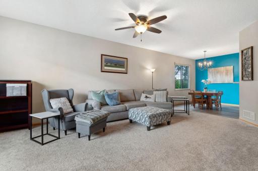 The spacious, light & bright living room has plenty of space for your large furniture and is the perfect place to entertain guests. The HOA fees include trash & water!