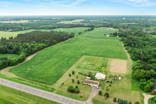 Welcome to 7702 County Rd 5! This sprawling property sits on 30 acres and includes a 3 BR home, pole barn, covered patio & more.