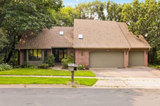 Executive Rambler with main level living and a 3-car attached garage. Walkout finished lower level. New: roof, carpet, refinished hardwood floors, fresh paint everywhere. Primary suite. 4BR/3BA. Photos coming soon! Move-in ready.