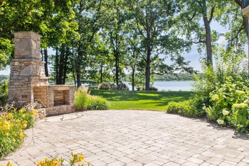 Outdoor fireplace with water fall and patio