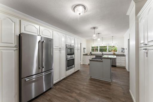 Fantastic kitchen was updated with SS Maytag appliances including double oven, cooktop and so much storage!