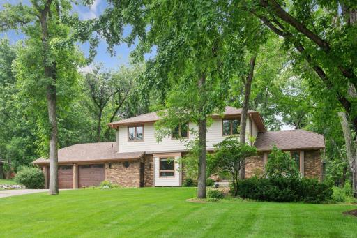 Attractive 2-story home on a private wooded lot