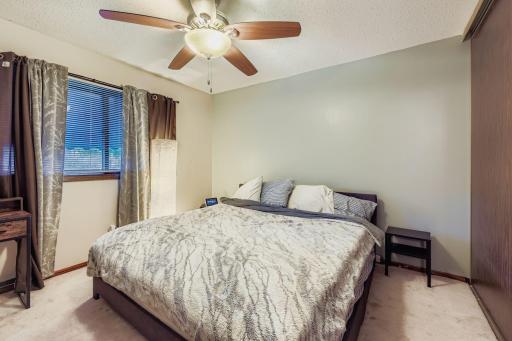6705 80th Ave N - Web Quality - 016 - 20 2nd Floor Primary Bedroom.jpg