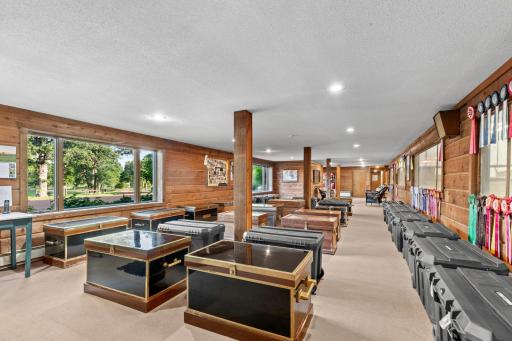 Main level lounge 19' x 65' and trunk storage - views into the Indoor Arena. Access to two bathrooms (men's and women's) and access to both South and North aisles and tack room