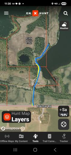 Proposed easement through Harms & Lill property to access west side of property.