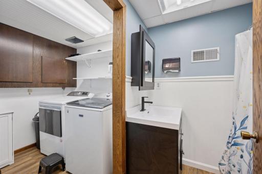 Here is an up close view of the laundry room and 3/4 bathroom.