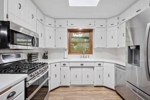 The kitchen window overlooks the covered front porch.