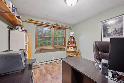 Bedroom 2 is currently being used as a office. This room overlooks the side yard.