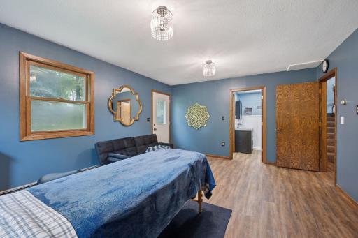 This room is located on the back of the house. It sits behind the tuckunder garage and is complete with a 3/4 bathroom and laundry room.