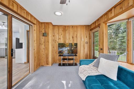 The 4 season porch has access to the back deck.
