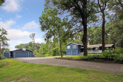 This magnificent home comes with 2 stall tuckunder garage and large 2 stall detached garage