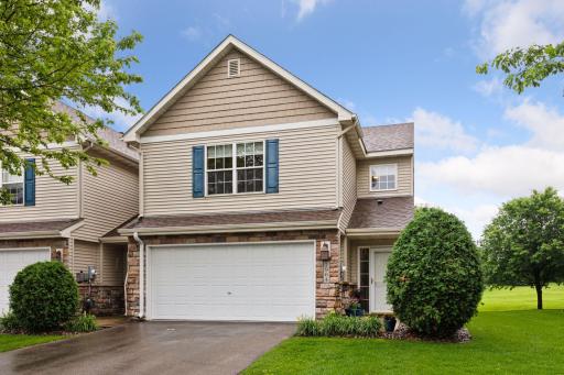 This townhome has an attractive exterior and backs up to greenspace. It has its own driveway for the two-stall garage.