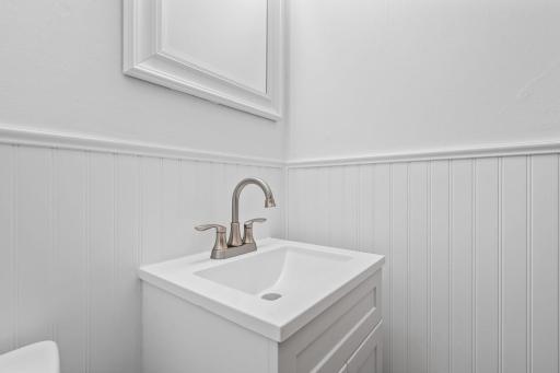 Wainscoting decorating main floor bathroom