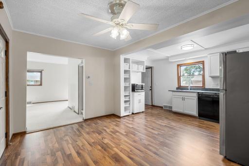 View into living room and kitchen from dining room