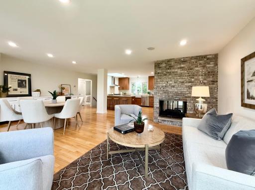 Cozy up to the double sided gas fire place in the winter while enjoying the pond views