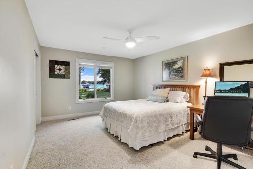 One of three oversized lower-level bedroom with large and deep closets and lake view