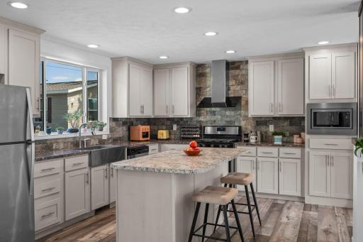 Welcome to this stunning and thoughtfully designed 3-bedroom, 2-bathroom home located in the peaceful Urban Grove Park community.