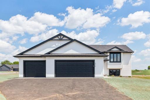 Photos are of a previously completed home with similar design and features. Actual selections, finishes, and materials may vary based on buyer choices and availability.
