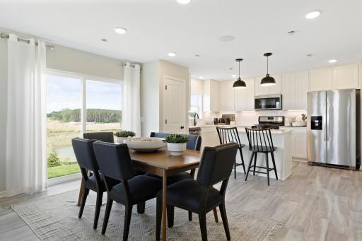 Photos are of a model home. Actual home currently under construction.