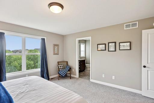 Primary Bedroom Leading to Primary Bath with Walk-in Closet