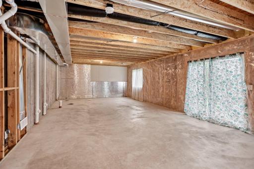 Unfinished Basement ready for another family room, bedroom, and bathroom!
