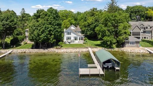 Welcome home to 465 Lakeview Avenue in Tonka Bay. An exquisitely renovated lakefront retreat on Gideon Bay.