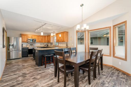 The dining area also offers seating at the breakfast bar. The 3 barstools are included with the home.