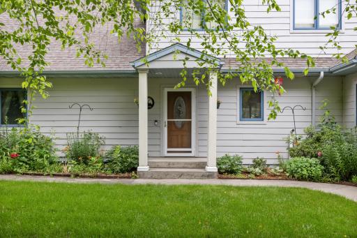 Main entrance w/beautiful perennial landscape
