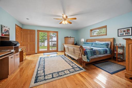 16 x 16 Master w/patio doors leading to lakeside area