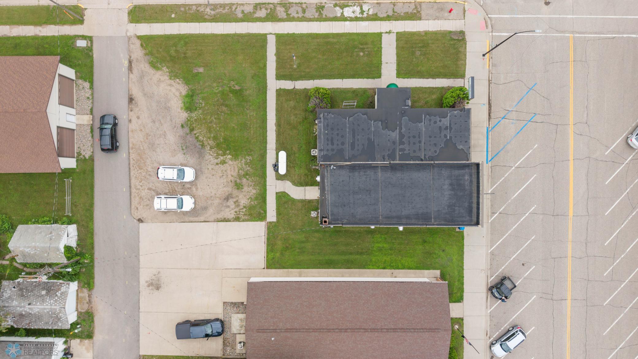 Aerial view of The Grove! Parking in front of building and through alley access for employees!