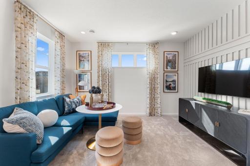 Generous use of windows fills the rec space with natural light.