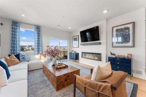 The spacious family room can accommodate many furniture arrangements and easily entertain larger gatherings.