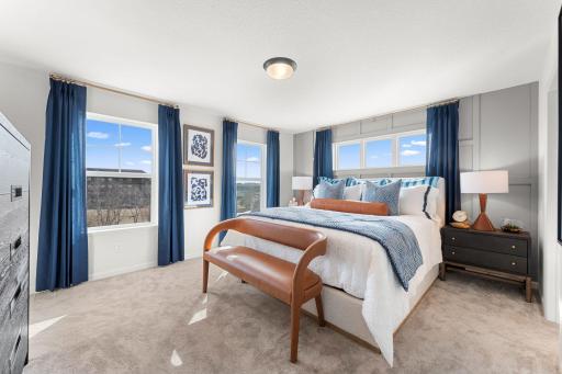 Owner's bedroom suite with generous use of windows.