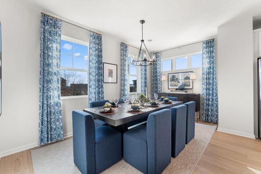 Imagine hosting family celebrations in this beautiful dining room! The expansive windows and 9'ceilings create the wow factor your looking for in a new home.
