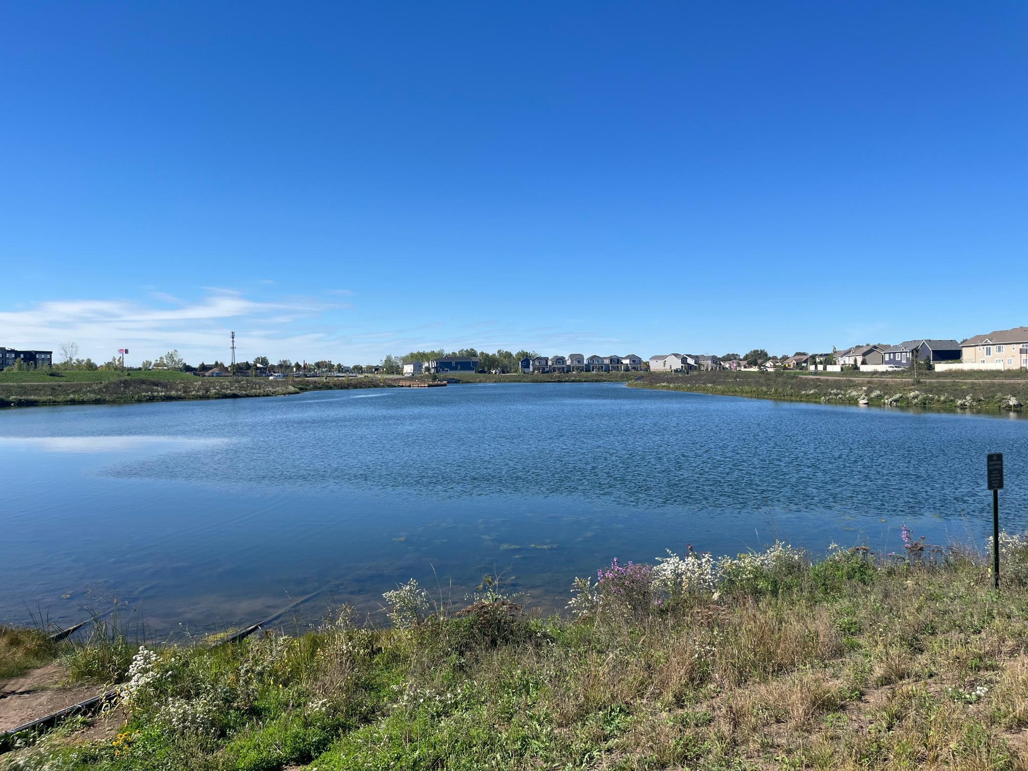 Another view of the fishing pond at The Waterfront Park. The pond has a beautiful walking path that goes around it making for nature filled walks.