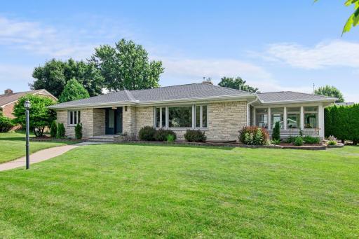 Welcome to this beautifully renovated rambler that blends mid-century charm with thoughtful, high-end updates throughout.
