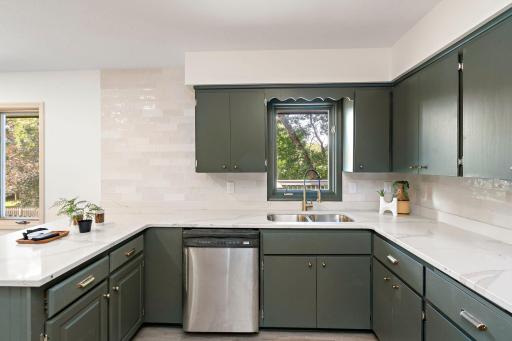 Enjoy single level living with functional flow, updated finishes, and a fully finished walkout lower level for extra flexibility and space.