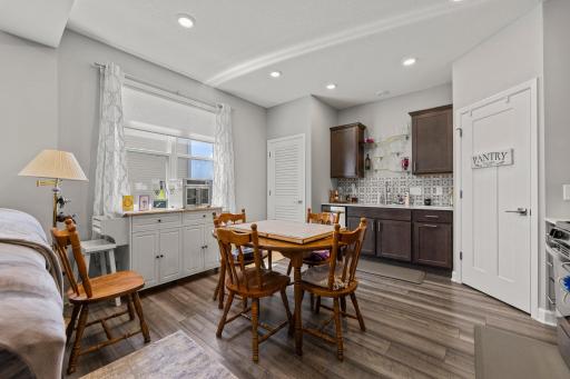 NEXT GEN dining room / kitchen with laundry and pantry.