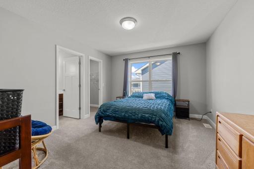 Bedroom 2 with walk-in closet and 3/4 bathroom.