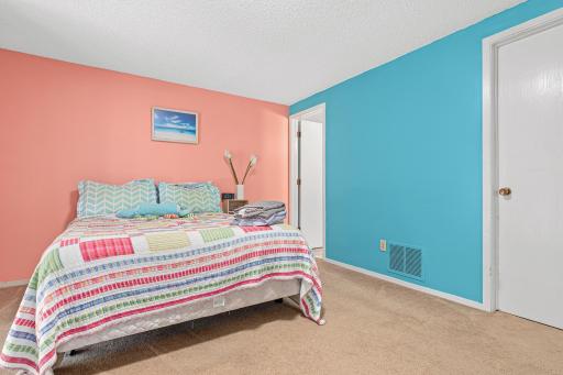 Lower level bedroom suite with bathroom and sitting area