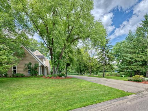 Welcome to 10245 183rd St W, located in the prestigious Woodbridge Estates of Lakeville. This beautiful home sits on a spacious 1-acre lot facing a natural pond, mature trees and plenty or nature providing a private setting.