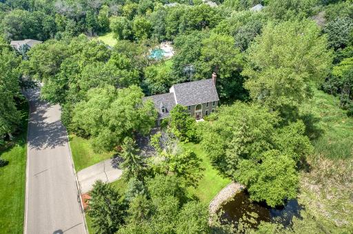 Welcome to 10245 183rd St W, located in the prestigious Woodbridge Estates of Lakeville. This beautiful home sits on a spacious 1-acre lot offering private views and features 4 bedrooms and 4 bathrooms.
